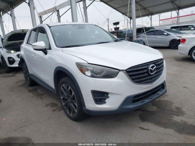  Salvage Mazda Cx