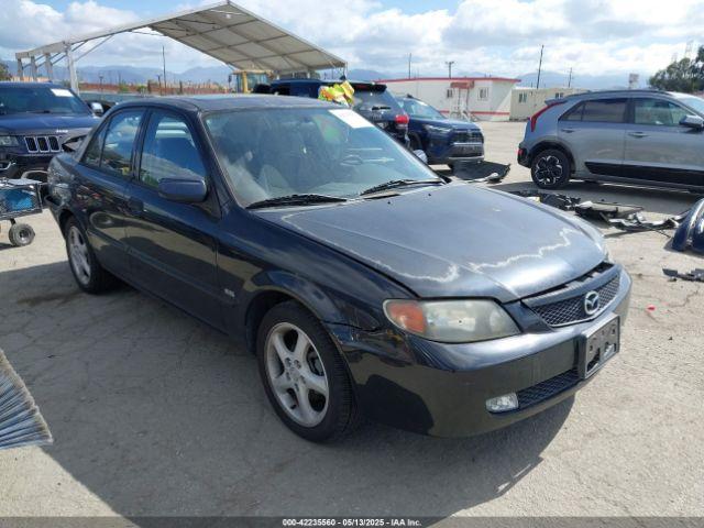  Salvage Mazda Protege