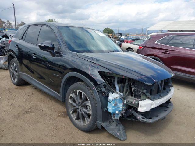  Salvage Mazda Cx