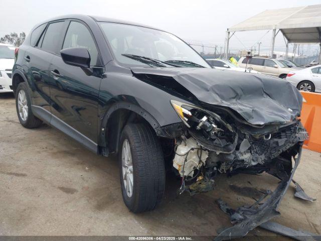  Salvage Mazda Cx