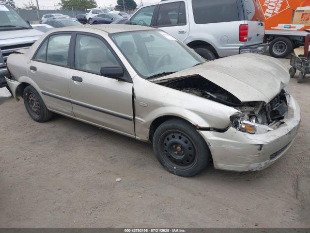  Salvage Mazda Protege