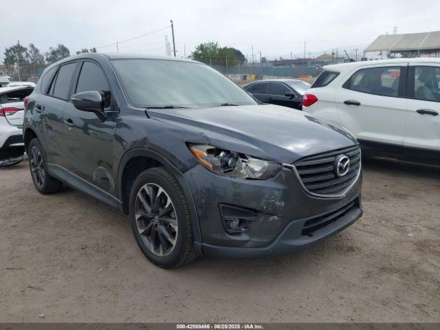  Salvage Mazda Cx