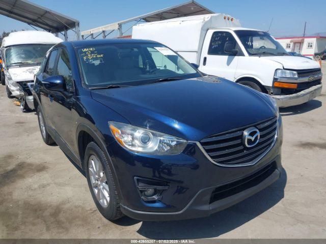  Salvage Mazda Cx