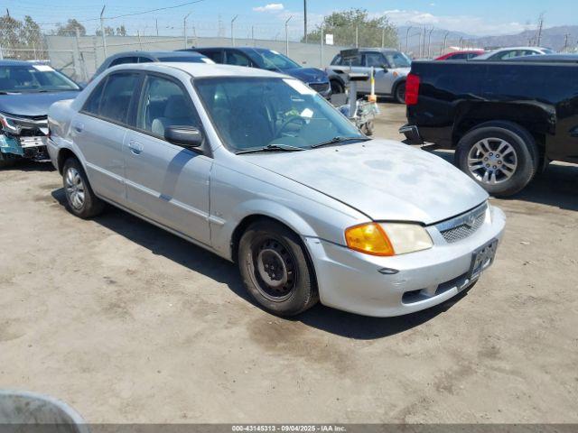  Salvage Mazda Protege
