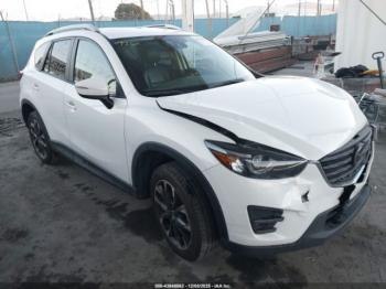  Salvage Mazda Cx
